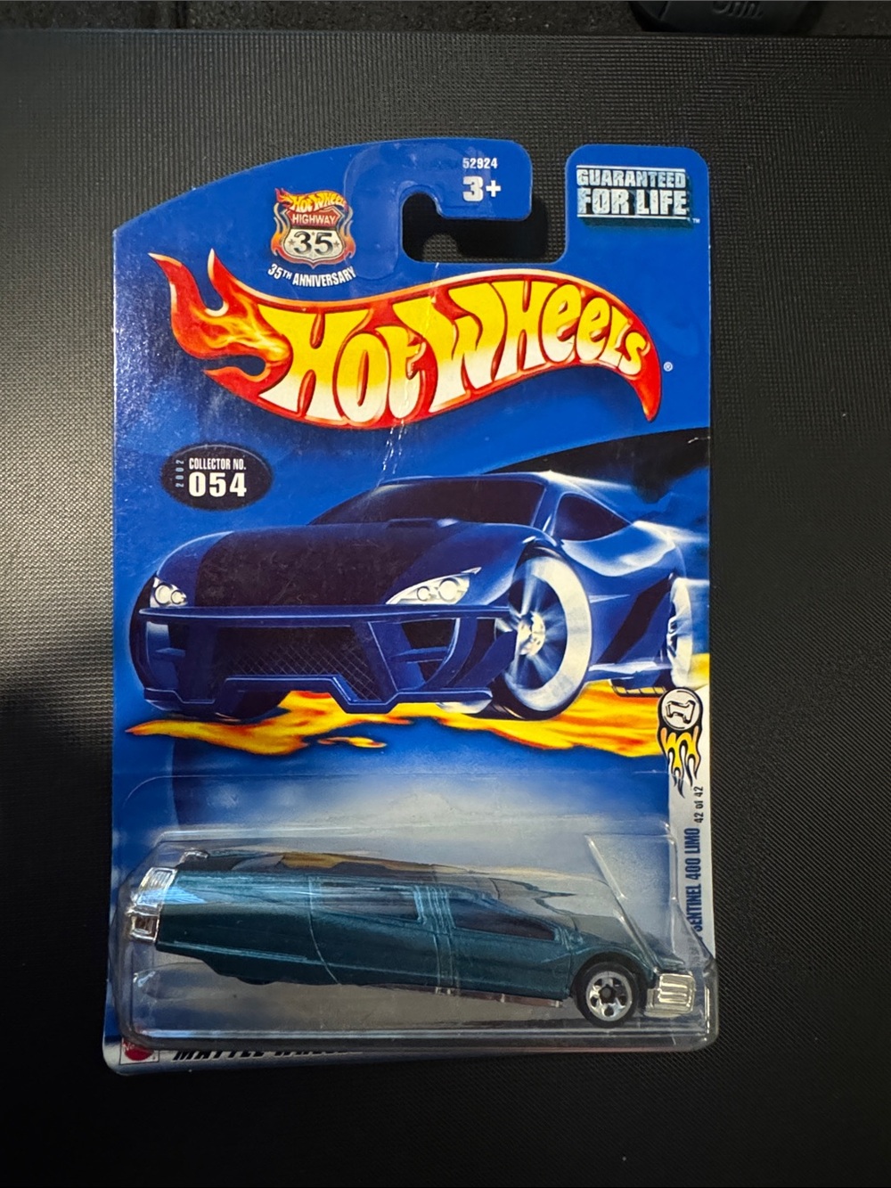Vintage Hot Wheels Blue Metallic Toy Car - Collector No. 054